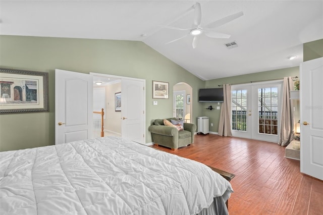 490 Wekiva Preserve Dr, Apopka, FL 32712 - bedroom with lofted ceiling, wood finished floors, arched walkways, and a ceiling fan