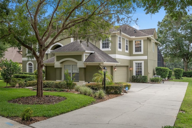 490 Wekiva Preserve Dr, Apopka, FL 32712 - traditional-style home featuring stucco siding, driveway, a shingled roof, and a front yard