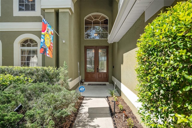 490 Wekiva Preserve Dr, Apopka, FL 32712 - property entrance with french doors and stucco siding