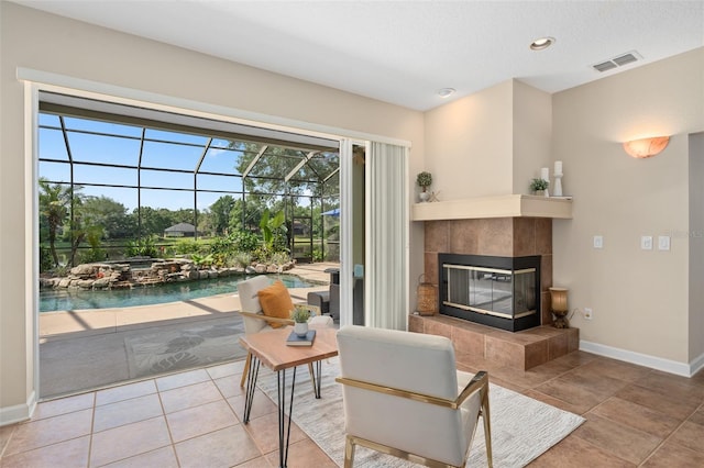 490 Wekiva Preserve Dr, Apopka, FL 32712 - living room with a sunroom, baseboards, tile patterned flooring, and recessed lighting