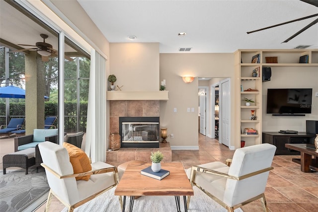 490 Wekiva Preserve Dr, Apopka, FL 32712 - living area featuring ceiling fan, a fireplace, light tile patterned flooring, baseboards, and recessed lighting