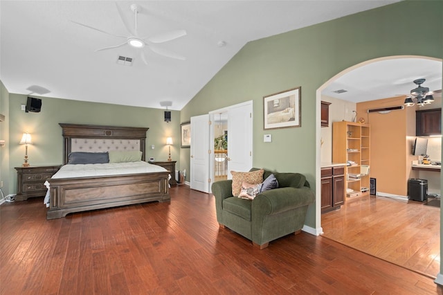 490 Wekiva Preserve Dr, Apopka, FL 32712 - bedroom with arched walkways, dark wood-style flooring, a ceiling fan, and high vaulted ceiling
