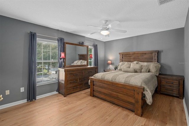 490 Wekiva Preserve Dr, Apopka, FL 32712 - bedroom featuring light wood-style floors, baseboards, and a ceiling fan