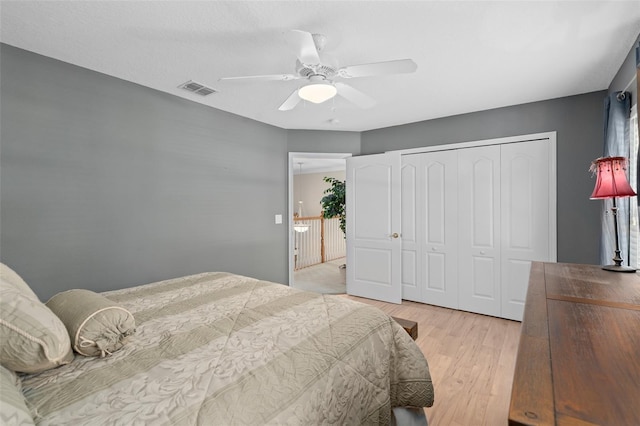 490 Wekiva Preserve Dr, Apopka, FL 32712 - bedroom with a closet, light wood finished floors, and ceiling fan