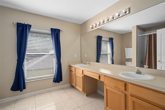 490 Wekiva Preserve Dr, Apopka, FL 32712 - full bath with double vanity, tile patterned flooring, toilet, a shower with shower curtain, and baseboards