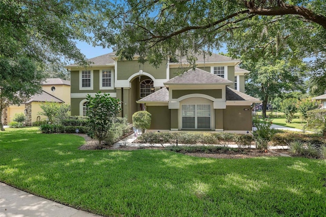 490 Wekiva Preserve Dr, Apopka, FL 32712 - traditional-style home with stucco siding, a front yard, and a shingled roof