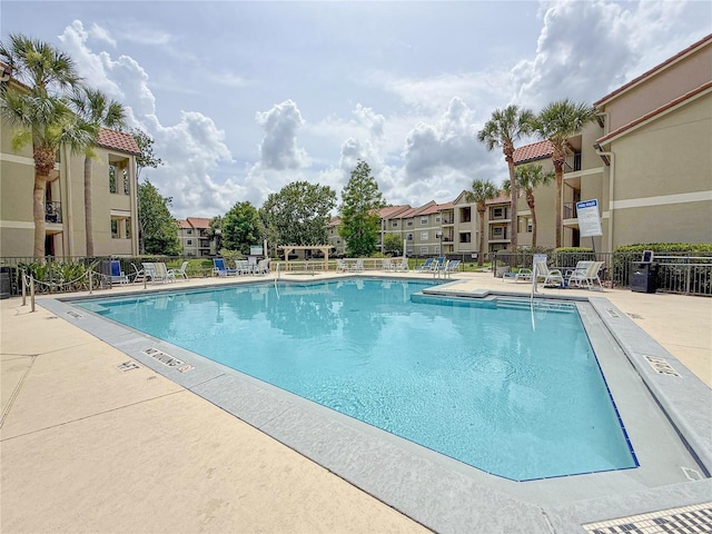 3034 Parkway Blvd Unit 102, Kissimmee, FL 34747 - community pool with a patio and a residential view