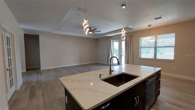3269 Ponce De Leon Blvd, North Port, FL 34291 - kitchen featuring a sink, french doors, dishwasher, and light wood-style floors
