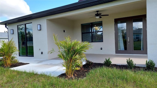 3269 Ponce De Leon Blvd, North Port, FL 34291 - view of home's exterior featuring french doors, a ceiling fan, and stucco siding