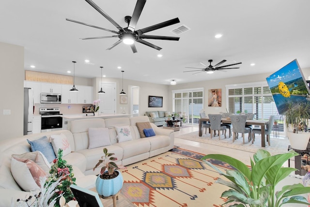 1425 Lone Wood Blvd, Orlando, FL 32828 - living area featuring ceiling fan and recessed lighting
