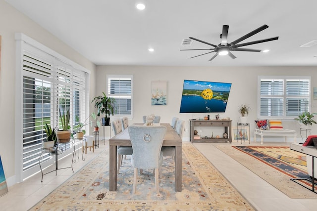 1425 Lone Wood Blvd, Orlando, FL 32828 - tiled dining room with recessed lighting and ceiling fan