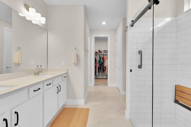 1425 Lone Wood Blvd, Orlando, FL 32828 - full bath with a tile shower, double vanity, a spacious closet, baseboards, and recessed lighting