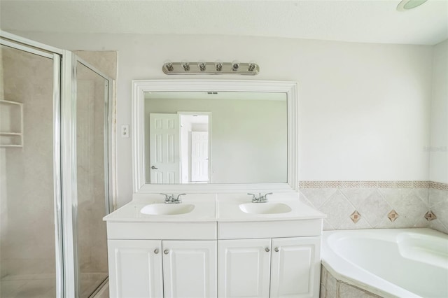 657 Mckinley Ct, Kissimmee, FL 34758 - bathroom with a stall shower, a bath, and double vanity