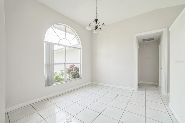 657 Mckinley Ct, Kissimmee, FL 34758 - empty room featuring a chandelier, light tile patterned floors, and baseboards