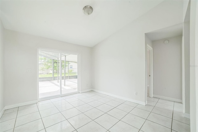 657 Mckinley Ct, Kissimmee, FL 34758 - empty room featuring light tile patterned flooring and baseboards