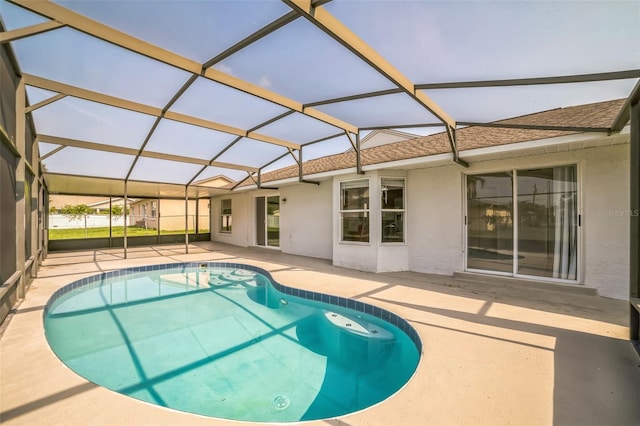657 Mckinley Ct, Kissimmee, FL 34758 - swimming pool featuring a patio area and glass enclosure