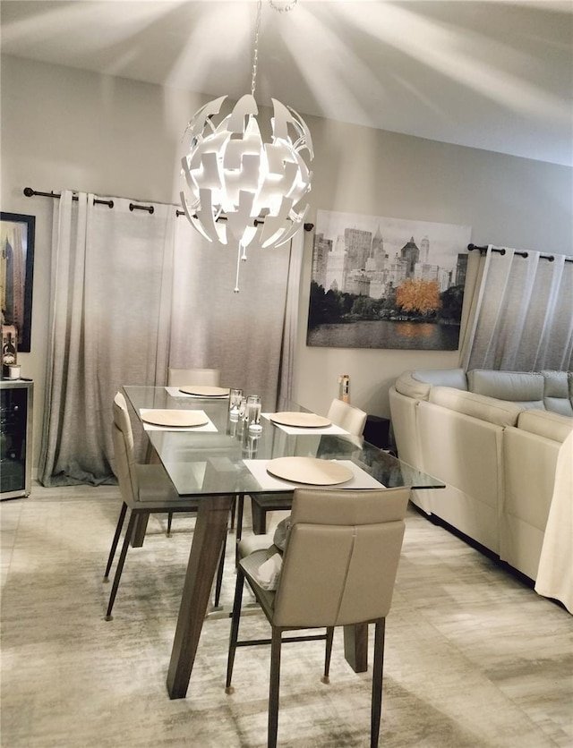 725 Ashworth Overlook Dr Unit C, Apopka, FL 32712 - dining room featuring a chandelier and beverage cooler