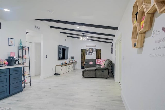 living area featuring light wood-style floors, recessed lighting, and baseboards
