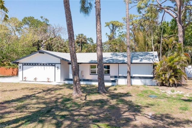 single story home with an attached garage