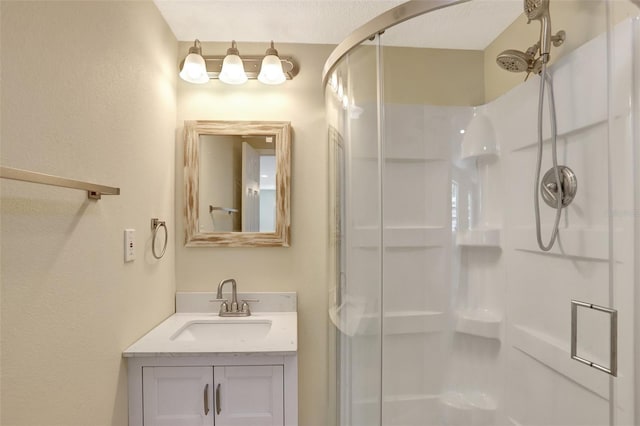 2835 Bongart Rd, Winter Park, FL 32792 - bathroom featuring a shower stall, vanity, and a textured wall