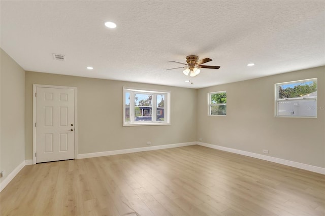 2835 Bongart Rd, Winter Park, FL 32792 - empty room with a ceiling fan, light wood finished floors, recessed lighting, baseboards, and a textured ceiling