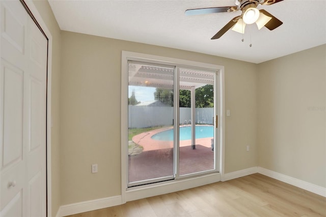 2835 Bongart Rd, Winter Park, FL 32792 - spare room featuring light wood-style floors, baseboards, and ceiling fan