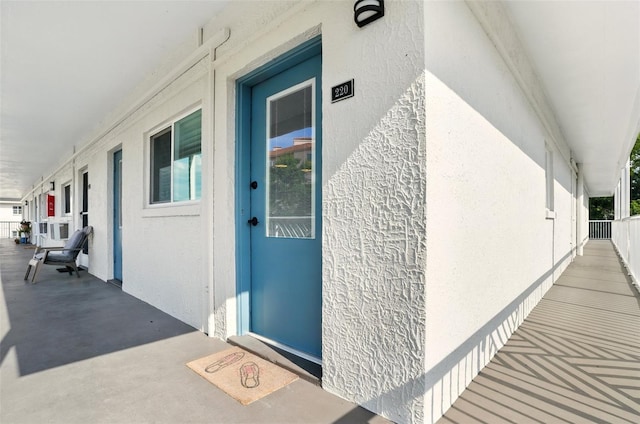 320 Lakeview St Unit 220, Orlando, FL 32804 - doorway to property with stucco siding