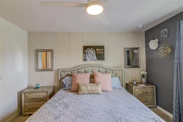 322 Annabelle Way, Davenport, FL 33837 - bedroom featuring an accent wall, a ceiling fan, and carpet floors