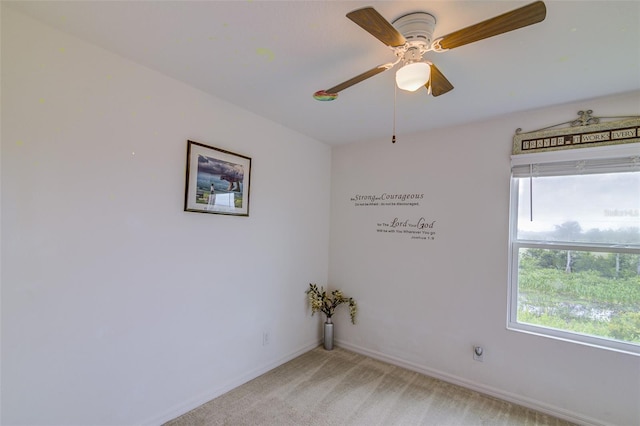 322 Annabelle Way, Davenport, FL 33837 - unfurnished room featuring healthy amount of natural light, light carpet, and ceiling fan