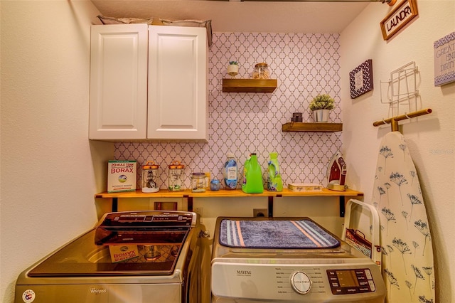 322 Annabelle Way, Davenport, FL 33837 - kitchen with open shelves, washing machine and clothes dryer, and white cabinets