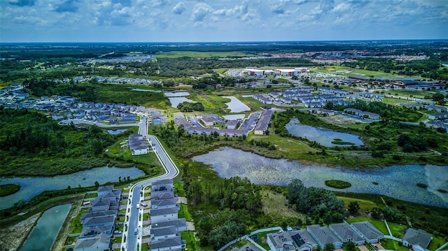 322 Annabelle Way, Davenport, FL 33837 - aerial view of property and surrounding area with a large body of water and nearby suburban area