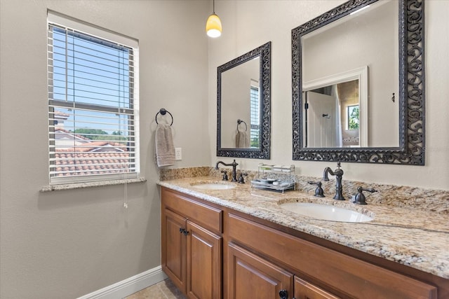 1010 Juliette Blvd, Mount Dora, FL 32757 - full bath with plenty of natural light, double vanity, and baseboards