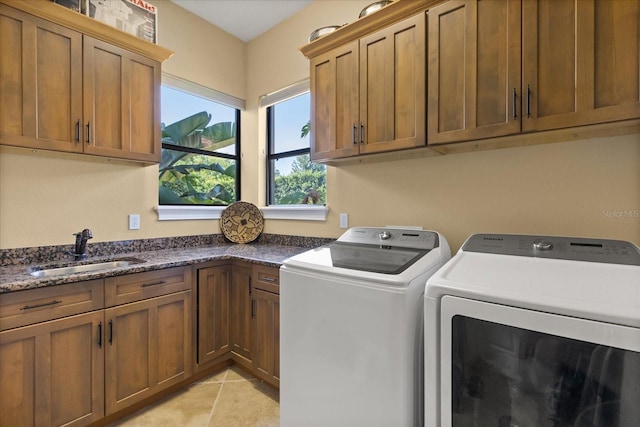 1010 Juliette Blvd, Mount Dora, FL 32757 - laundry room featuring separate washer and dryer, cabinet space, and light tile patterned floors