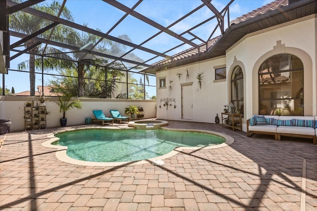 1010 Juliette Blvd, Mount Dora, FL 32757 - view of pool with a patio, a pool with connected hot tub, glass enclosure, and an outdoor hangout area