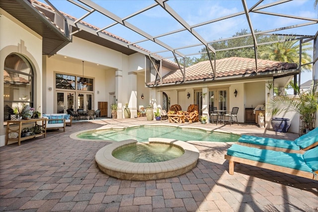 1010 Juliette Blvd, Mount Dora, FL 32757 - rear view of property featuring french doors, stucco siding, a patio area, and a tile roof