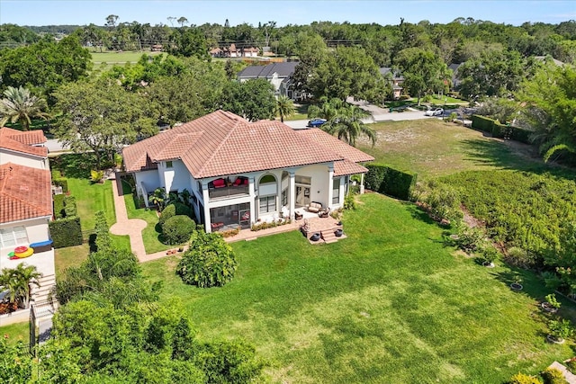 1010 Juliette Blvd, Mount Dora, FL 32757 - view of subject property with a tree filled landscape