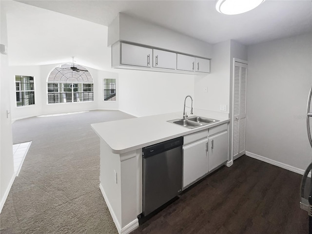 3142 Britannia Blvd Unit C, Kissimmee, FL 34747 - kitchen with stainless steel dishwasher, a sink, light countertops, baseboards, and a ceiling fan