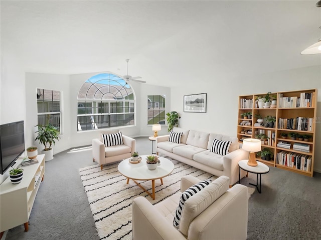 3142 Britannia Blvd Unit C, Kissimmee, FL 34747 - living area with carpet flooring, a ceiling fan, and lofted ceiling