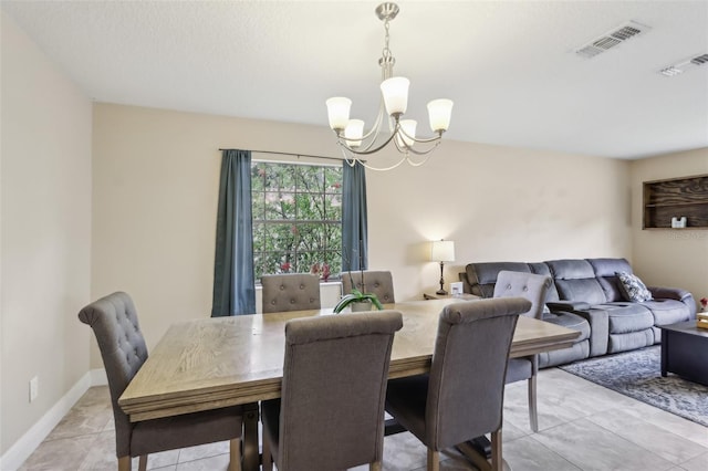 8652 Savory Dr, Orlando, FL 32825 - dining room with a chandelier