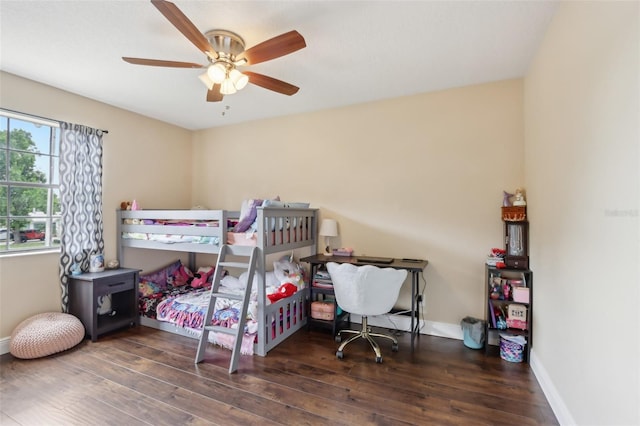 8652 Savory Dr, Orlando, FL 32825 - bedroom with wood finished floors, baseboards, and ceiling fan