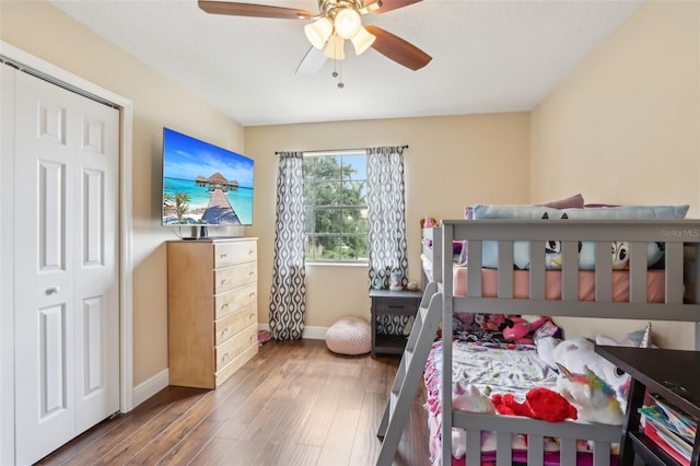 8652 Savory Dr, Orlando, FL 32825 - bedroom featuring baseboards, wood finished floors, and ceiling fan