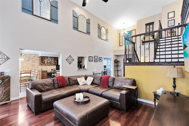 556 Lake Ave, Altamonte Springs, FL 32701 - living room with a chandelier, wood finished floors, a ceiling fan, stairway, and a high ceiling