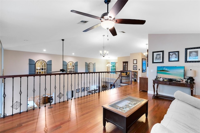 556 Lake Ave, Altamonte Springs, FL 32701 - living room with a ceiling fan, a chandelier, wood finished floors, recessed lighting, and vaulted ceiling