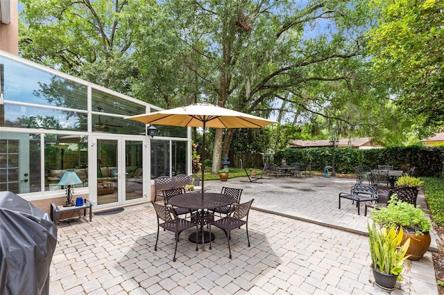 556 Lake Ave, Altamonte Springs, FL 32701 - view of patio / terrace featuring outdoor dining area and french doors