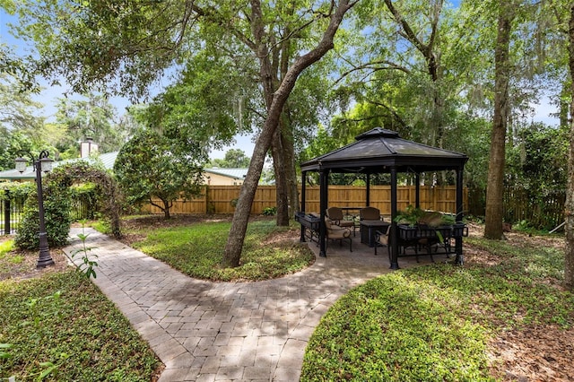 556 Lake Ave, Altamonte Springs, FL 32701 - fenced backyard with a gazebo and a patio
