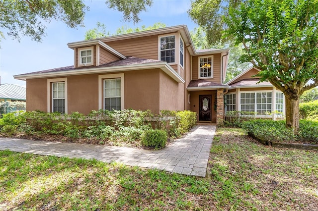 556 Lake Ave, Altamonte Springs, FL 32701 - view of front of property with roof with shingles and stucco siding