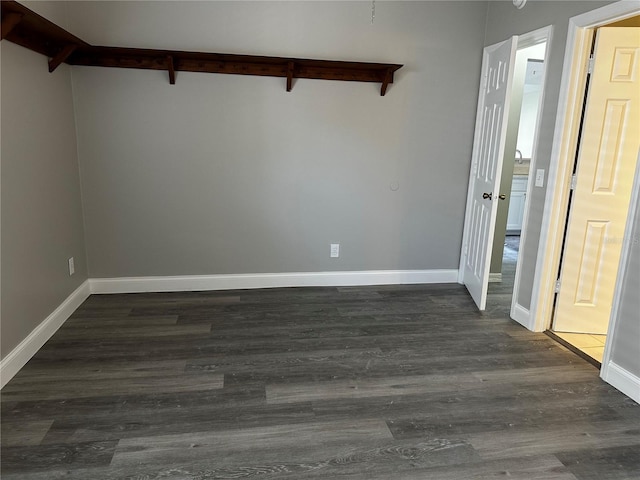 652 Roaring Dr Unit 234, Altamonte Springs, FL 32714 - unfurnished room featuring dark wood finished floors and baseboards