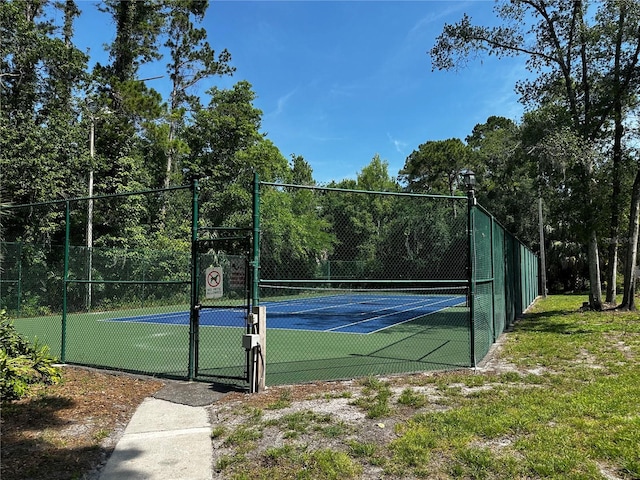 652 Roaring Dr Unit 234, Altamonte Springs, FL 32714 - view of tennis court with a gate