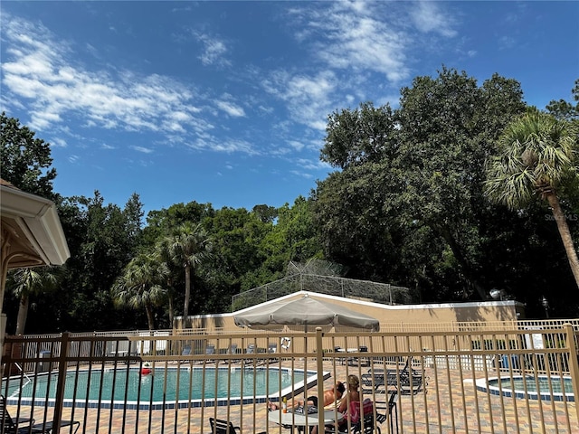 652 Roaring Dr Unit 234, Altamonte Springs, FL 32714 - community pool featuring view of scattered trees