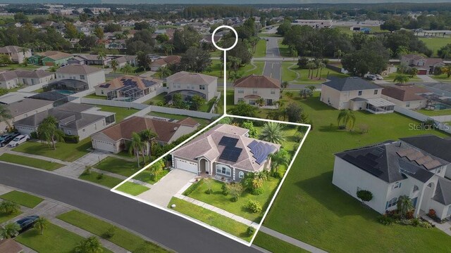 5203 Jasmine Trace Ln, Kissimmee, FL 34758 - aerial perspective of suburban area with property boundaries highlighted